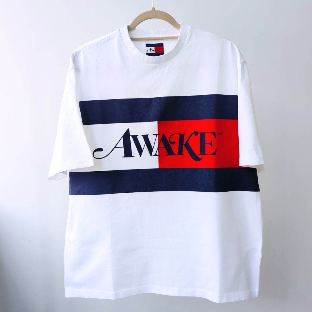 『Tommy ×Awake NY Flag Tee』コラボアイテム フラッグTシャツ 半袖 ホワイト