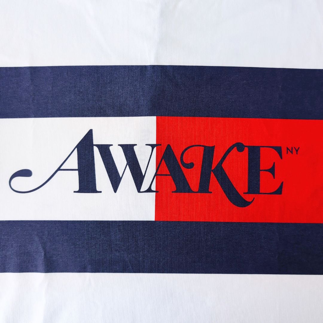 『Tommy ×Awake NY Flag Tee』コラボアイテム フラッグTシャツ 半袖 ホワイト