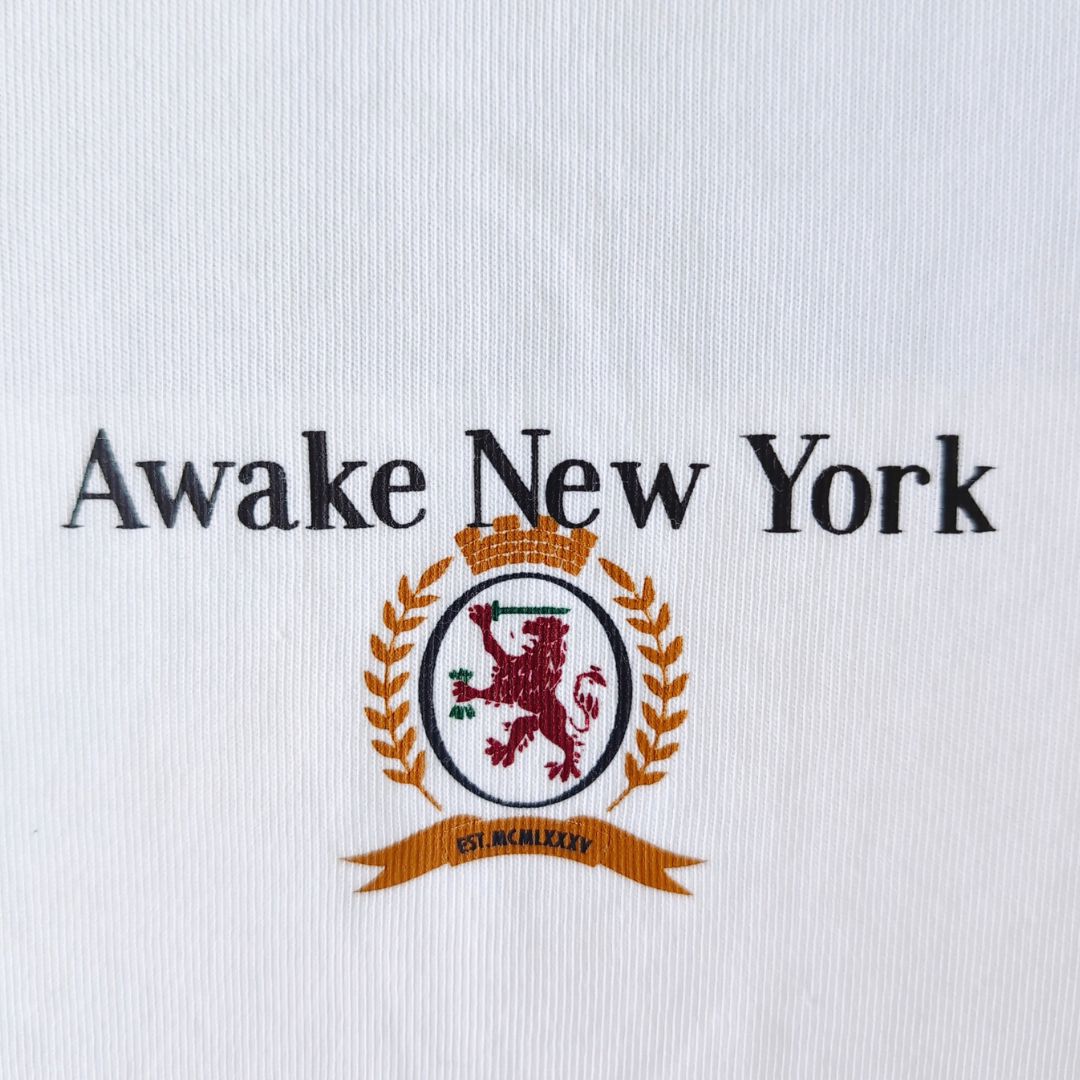 『Tommy ×Awake NY Flag Tee』コラボアイテム フラッグTシャツ 半袖 ホワイト